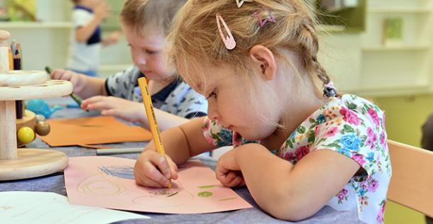 Children drawing together